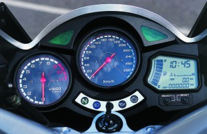 Tach, speedo plus LCD display for time, fuel and temp levels, dual tripmeters.