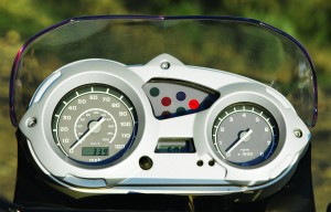 Analog gauges are simple and clear; there’s a single tripmeter and an LCD clock in the center.