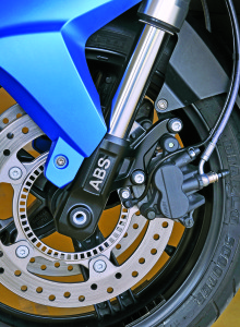 Triple disc brakes with ABS are standard on both scooters.