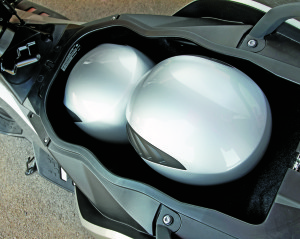 GT’s underseat storage holds two full-face helmets.