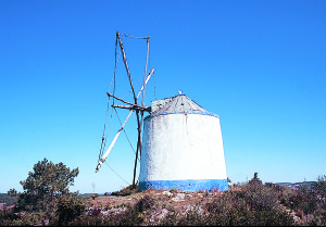 The old windmills of Portugal now serve more as decor than to grind wheat and barley.
