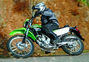 Go green to ride the well-balanced KLX250S. On-road or off, the tenacious Kawasaki is at home wherever you ride it.