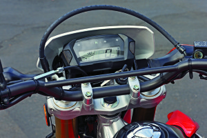 The CRF’s easy-to-read instrumentation includes a clock, dual tripmeters, odometer and fuel bar graph.