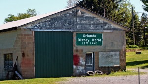 I am not sure if I follow these directions that I would end up in Disney World. This road sign was found in Grant County, West Virginia.
