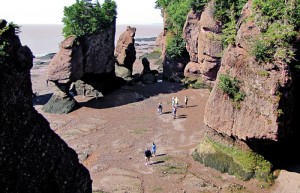 Walking on the ocean floor at low tide in Fundy Bay, New Brunswick, Canada.