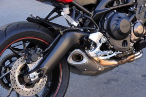 The sculpted swingarm and low-slung exhaust add to the FZ-09's curb appeal.