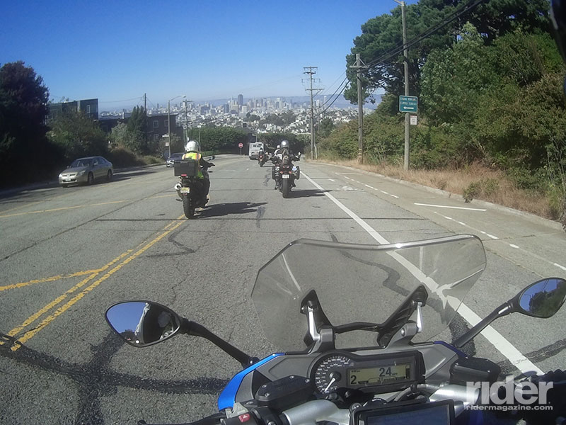 The best way to see San Francisco is atop a motorcycle, being escorted through traffic along the most scenic avenues in the city. Helmet-cam shot courtesy of my Sena 10C. (Photo: the author)