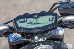 The display sits back over the handlebar, forcing the rider to lower their chin to read it when wearing a full-face helmet.