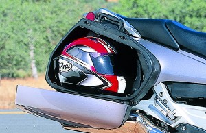 Saddlebags will hold a large full-face helmet, and there are helmet loops under the locking seat. A key must be used to open and close bags, however, which prevents them from accidentally opening underway but can be inconvenient.