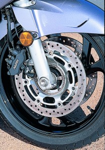Bike comes standard with triple disc brakes with three-piston, pin-slide-type calipers that are linked front-to-back and back-to-front.