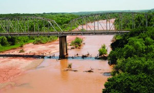 That’s the Brazos River, too thick to drink, too thin to plough.