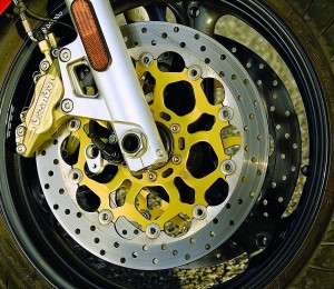 Powerful Brembo brakes do a great job stopping. Arrow shows ABS sensor mounting point.