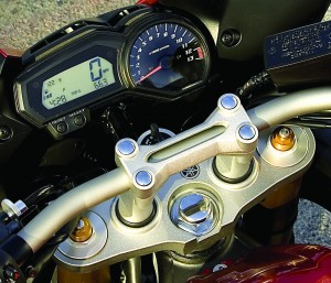 Both tach and speedo are easy to read. Tall rubber-mounted risers isolate vibration and add comfort.