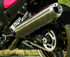 Four-into-two exhaust has enormous mufflers that are mounted low to clear luggage.