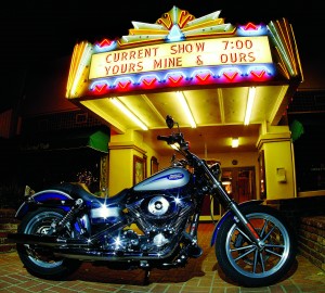 The Dyna Low Rider looks great in front of an old theater.
