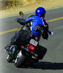 The backrest pivots; to remove it, you must unbolt the saddlebags.