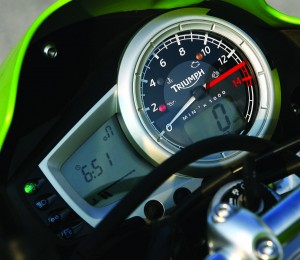 Huge tach dominates the gauge cluster, which also includes a gear indicator.