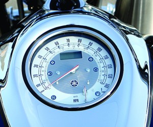 Retro-look dash includes a speedometer, LCD panel and fuel gauge.