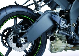 High-arching swingarm design adds rigidity and clears exhaust system.