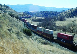 A virtually unbroken chain of train cars enters the Tehachapi loop daily. It’s considered one of the seven wonders of the railroad world.