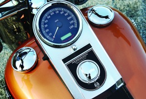 Harley-Davidson Heritage Softail Classic: The Harley features a basic speedometer and a fuel gauge in the left cap.
