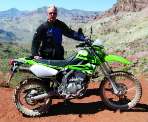 Not even a bad hair day can suppress your enthusiasm when you’re about to drop into colorful Titus Canyon on a new KLX.