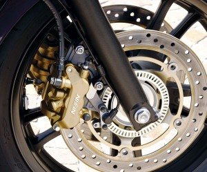 Linked brakes with ABS get three-piston  calipers up front.