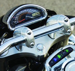 Instruments are clear and legible, but the warning lights are below the rider’s line of sight. The motor’s smooth, fast-revving nature yearns for the missing tachometer.
