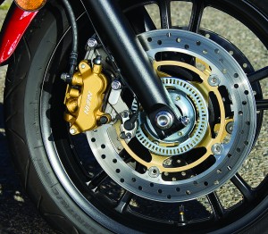 Combined triple disc brakes with ABS stop the DN-01 as hard as any sportbike, though we’re not fond of auto-type rear pedals.