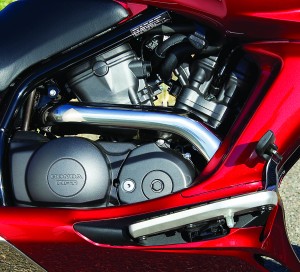 Liquid-cooled, 52-degree V-twin was given its 680cc size and output to complement the new HFT automatic transmission.