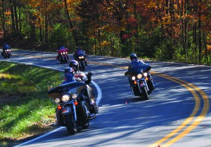 Riders enjoy the afternoon rolling through the curves and autumn splendor of State Route 52.