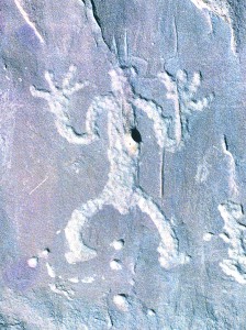 A human figure is etched into sandstone on the trail between Pueblo Bonito and Chetro Ketl.