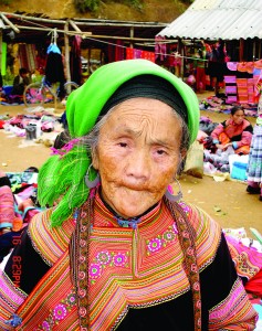 A Hmong woman poses for a photo.