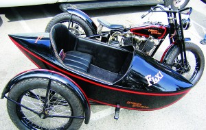 A 1930s FLXI sidecar, mounted to a Harley, tilts in the corners.