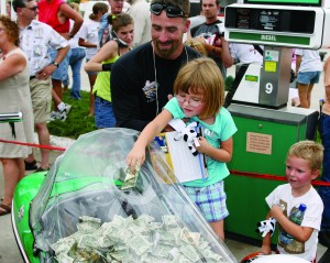 The spirit of giving is contagious. At gas stops, kids stuffed allowance money into a sidecar, all to help Kyle’s kids. The ride collected almost $53,000 from these spontaneous acts of kindness.