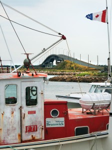Boat and bridge along Canada's Maritime provinces
