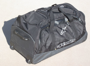 Carrying straps, haul handles, a telescoping double post handle and smooth-roll wheels make it easy to tote or drag the Alpinestars XL Transition Gear Bag around.