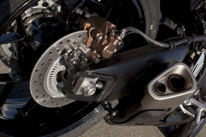 2012 Honda CBR1000RR: Honda's tried-and-true Unit Pro-Link swingarm easily handles the CBR's 150-plus rear wheel horsepower.