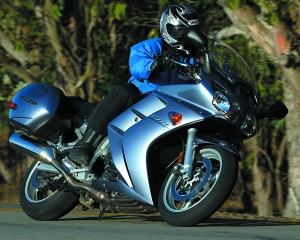 The only in-line, transverse four here, the Yamaha FJR1300’s liquid-cooled engine makes the most power but is buzzy.