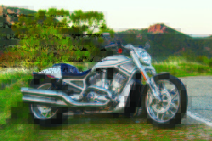 The Harley-Davidson V-Rod shines on the roadside.