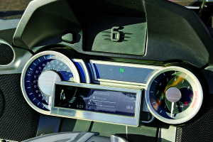 Sleek instruments on the K 1600 GTL use small fonts that can be difficult to read. Panel marked “6” is the GPS compartment.