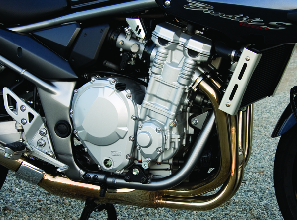 The 1250S goes liquid cooled, and with no cooling fins the engine has a cleaner look.