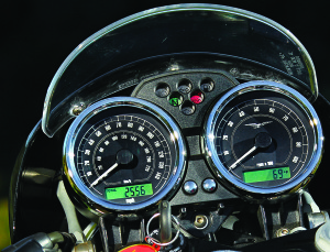 Retro-look gauges with warning lights keep the rider well informed.