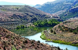 The Similkameen River flows lazily in the heat of summer between Oroville and Loomis, Washington.