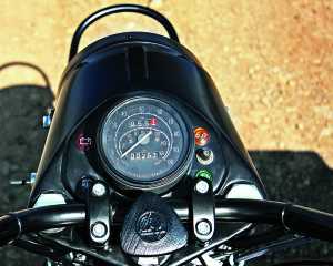 For the U.S. speedo is in mph, odometer and tripmeter in kilometers. Knob is a friction-type steering damper.