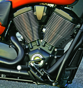 The air/oil-cooled Victory motor is tall because of its overhead cams.