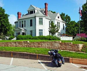 The house on the hill was built in 1885 by successful businessman W. A. McHenry, and is now the museum for the town of Denison.