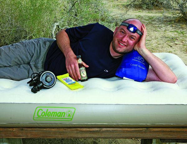 Coleman inflatable mattress, Intex air pump, Alps camp pillow, Princeton Tec headlight, antibacterial Wet Ones and Pickapeppa Sauce.