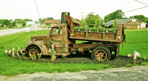 What can one do with an old dump truck? An enterprising person can turn it into the centerpiece of a flower garden.