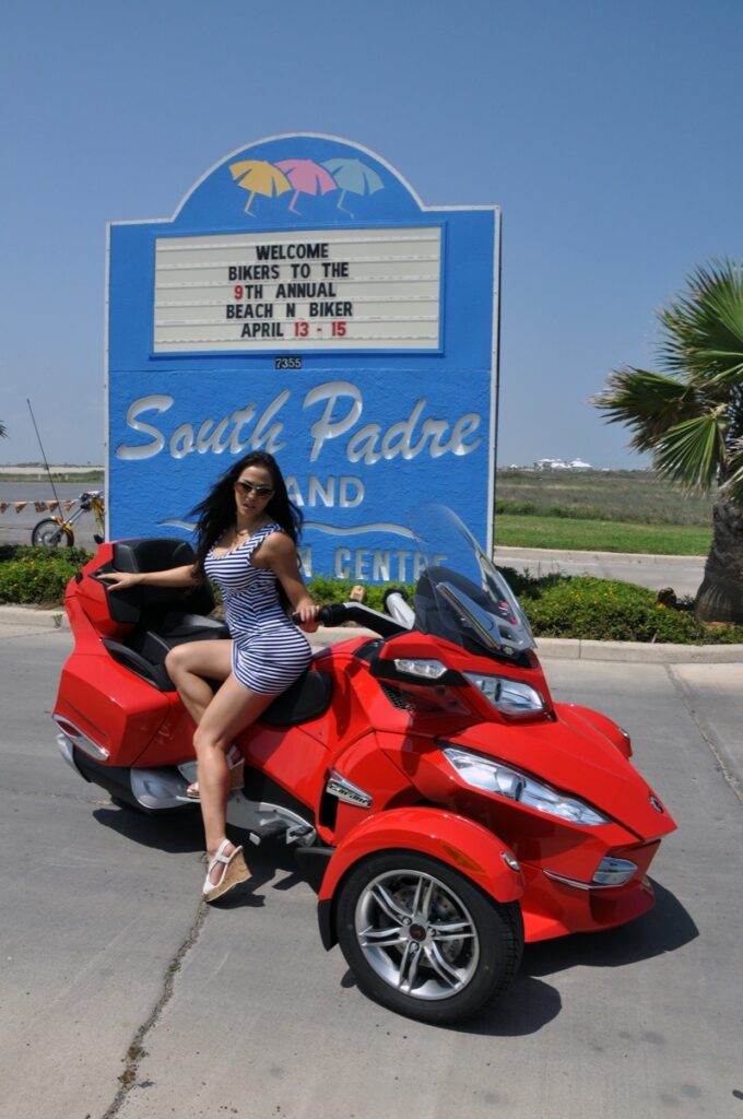 Playboy cyber girl and Glitz Doll Sheena Lee puts on an impromptu photo shoot aboard the Can-Am Spyder Roadster RT